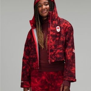 Team Canada 22 Cropped Jacket COC logo in Metamorphic Glow Red.